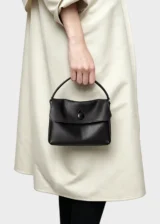 Black Elara Maison Soft Leather Small Top Handle Bag model carrying