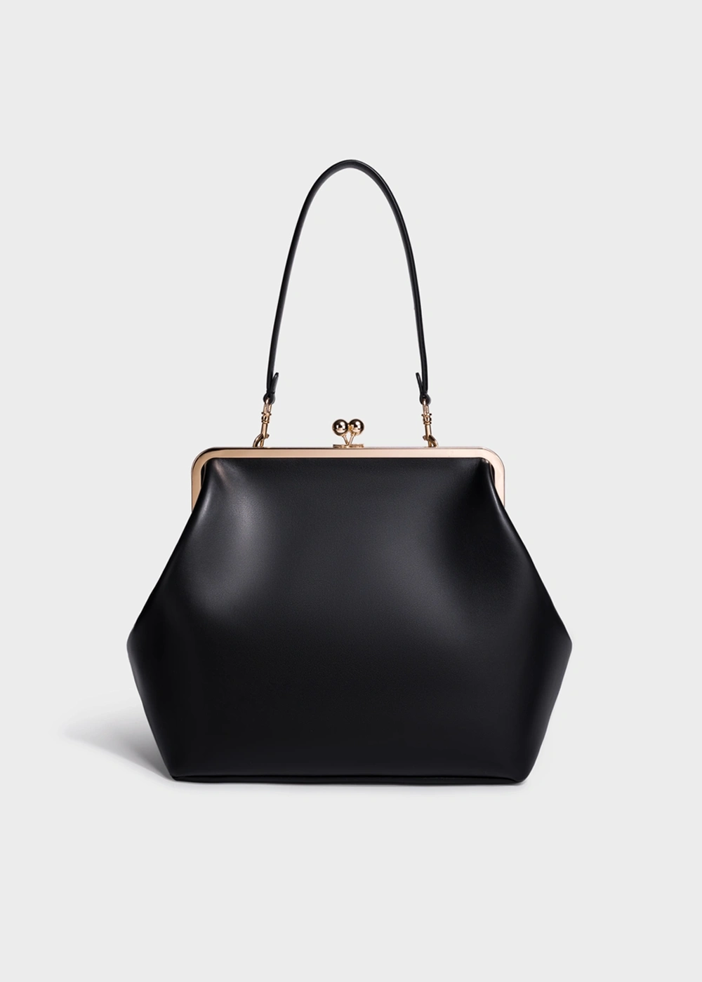 Black Serene Atelier classic vegan leather frame-clasp top handle bag.